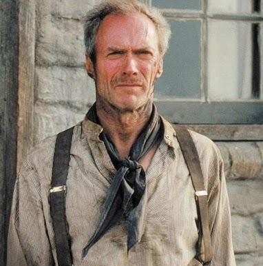 Młody Clint Eastwood w kultowej pozie filmowej, symbolizującej jego role w westernach lub jako Brudny Harry.